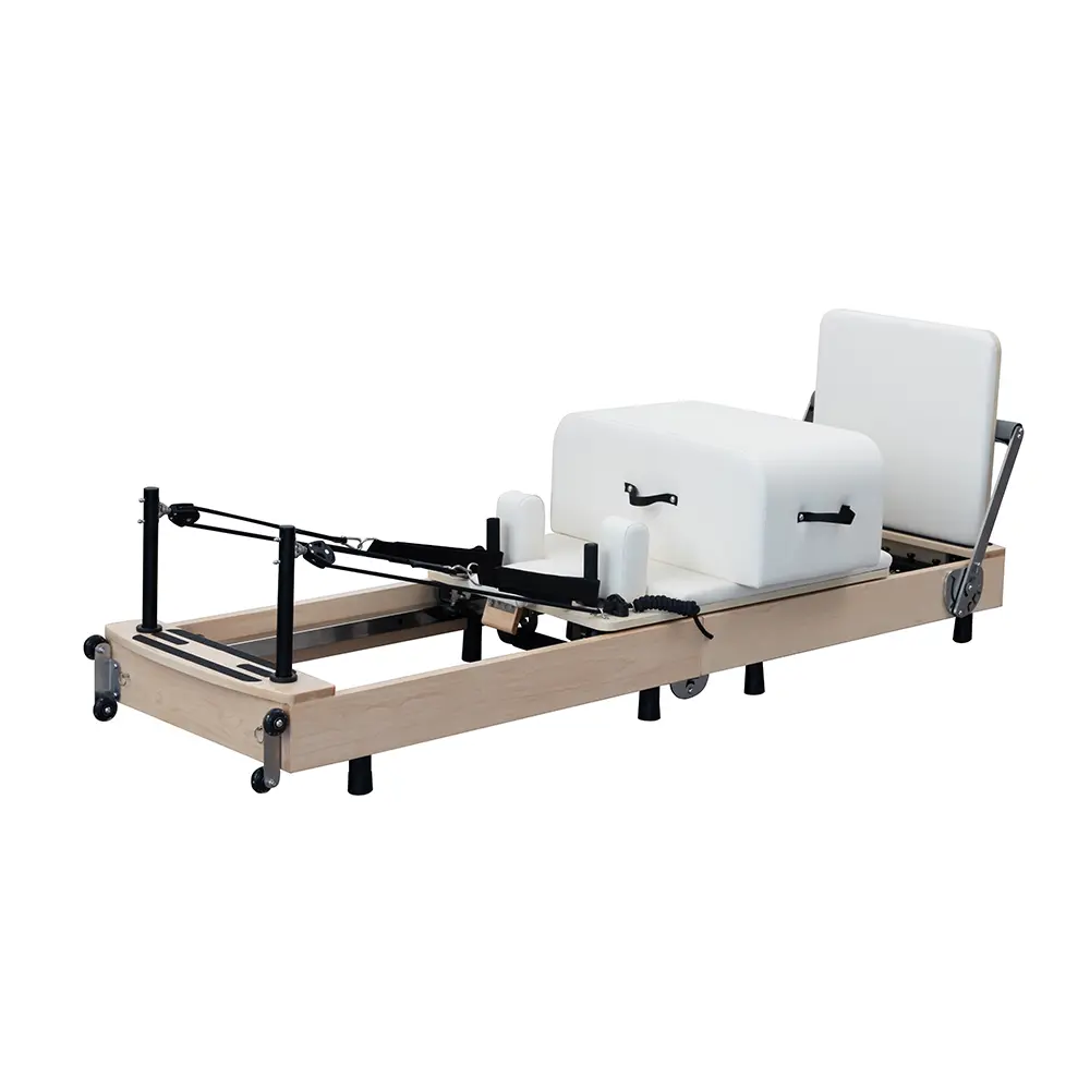 Maple Compact-Folding Pilates Reformer — compact folded configuration in a complete product view