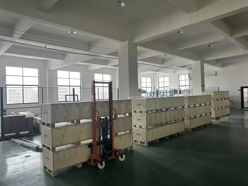Rows of wooden crates prepared for equipment packing.