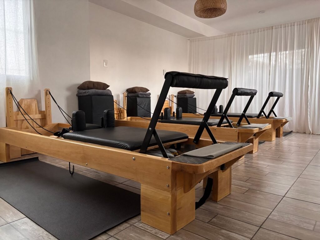 Wood vs. Aluminum Pilates Reformers: Style, Weight and Everyday Use